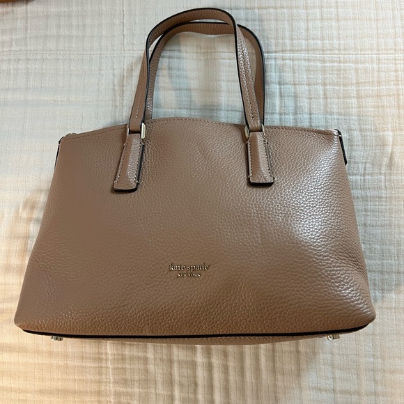 Kate Spade satchel with crossbody strap between a cream and tan color - Picture 2 of 4